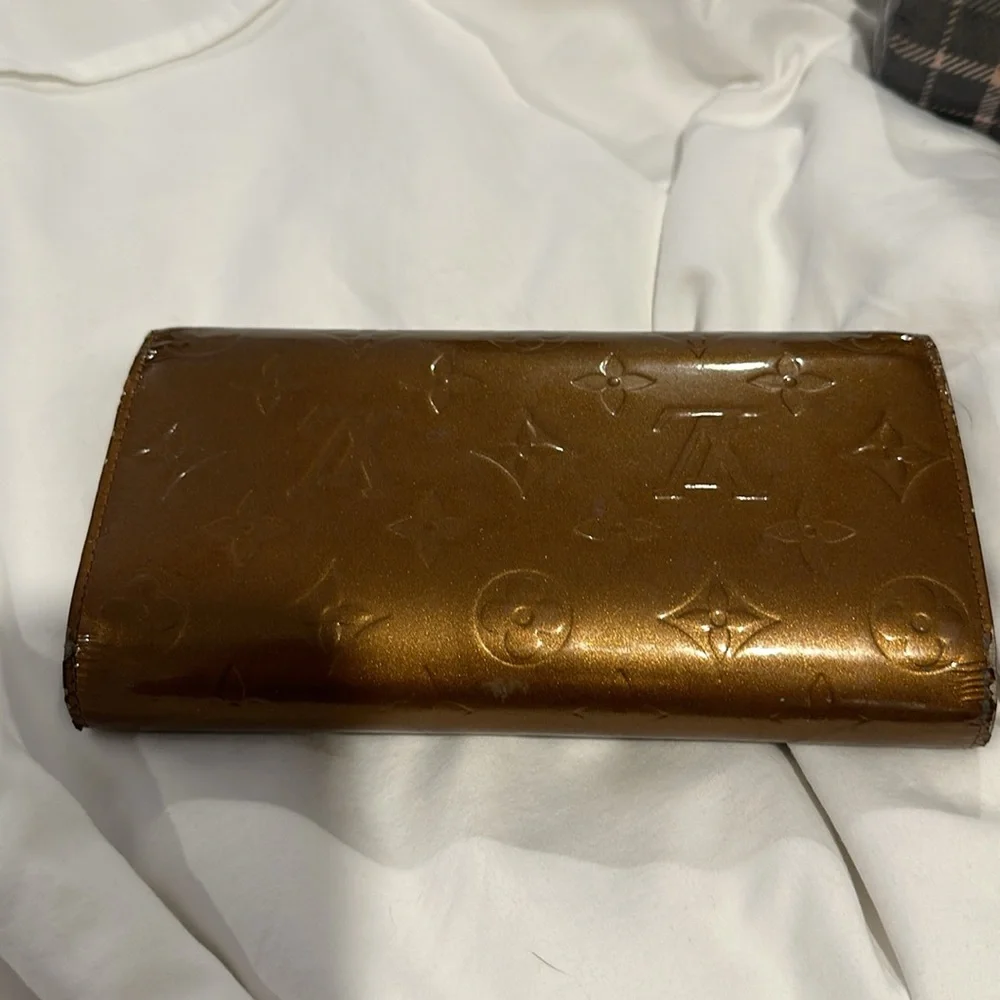 LOUIS VUITTON MONOGRAM VERNIS LONG WALLET TRIFOLD IN BRONZE